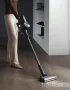Xiaomi Vacuum Cleaner G20 Max cordless stick vacuum with motorized floor head on a hardwood floor